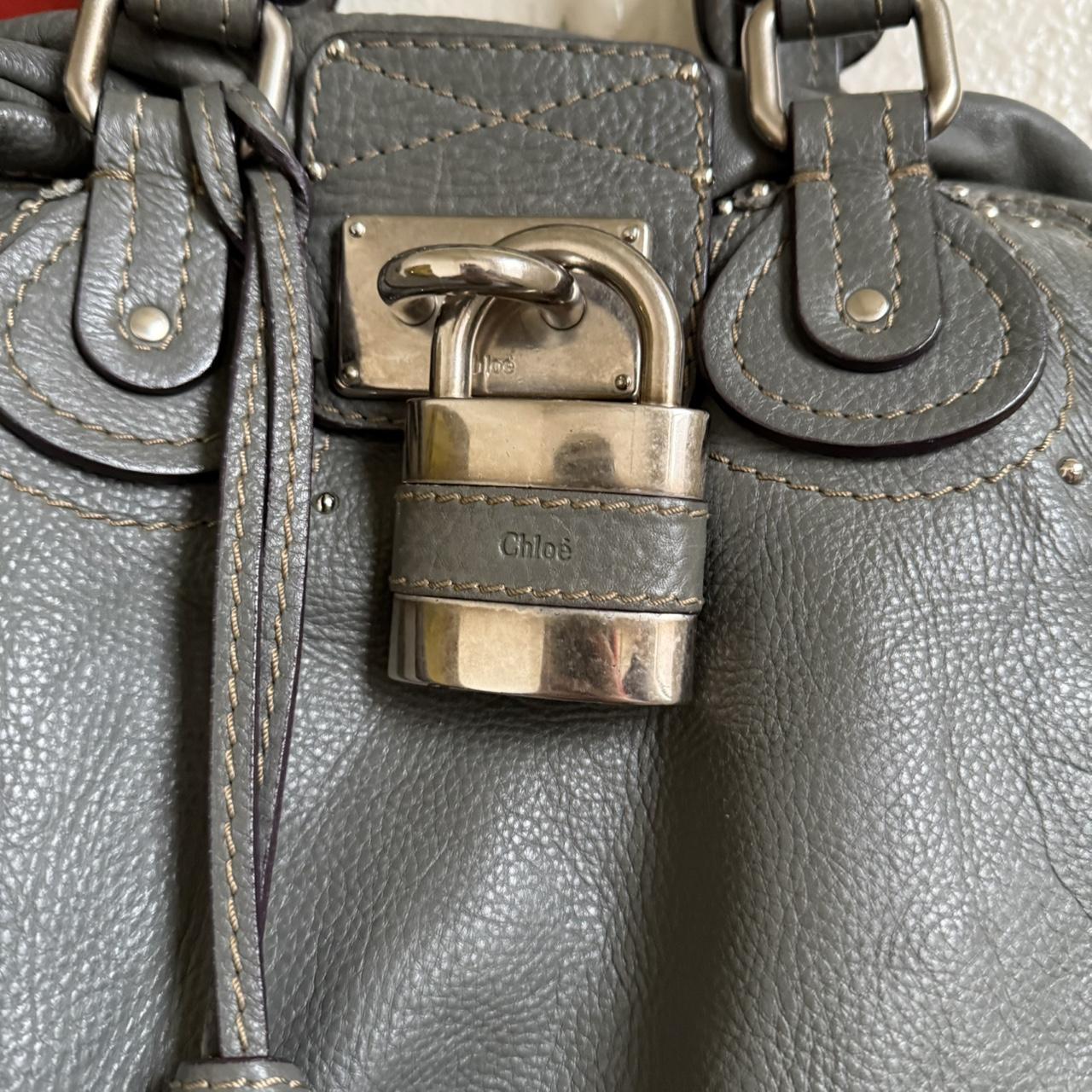 Rate Chloe paddington variation with zippers around in beautiful grey color and silver hardware