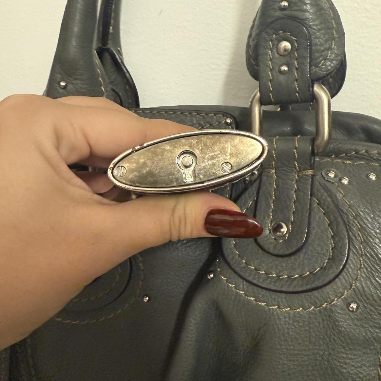 Rate Chloe paddington variation with zippers around in beautiful grey color and silver hardware