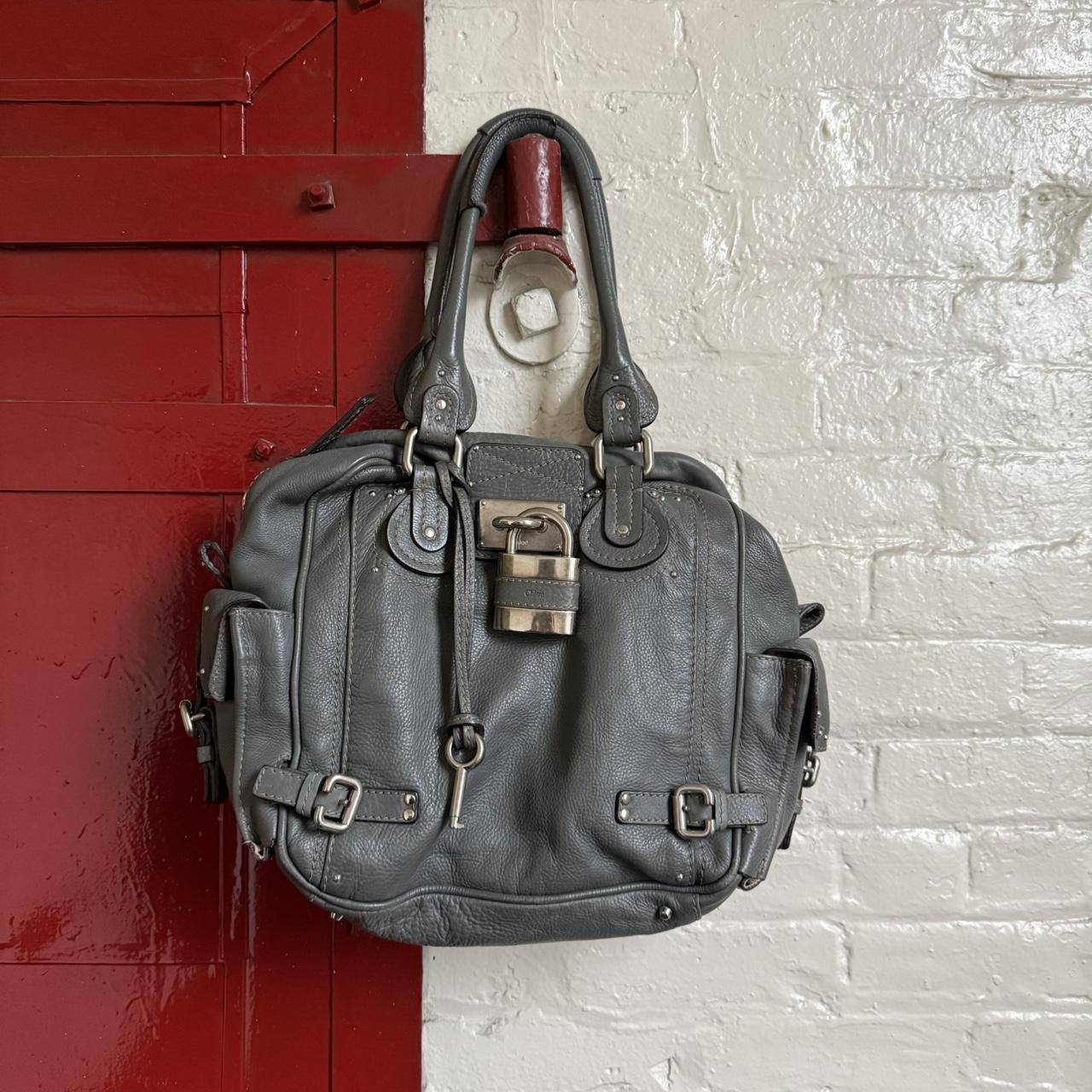 Rate Chloe paddington variation with zippers around in beautiful grey color and silver hardware